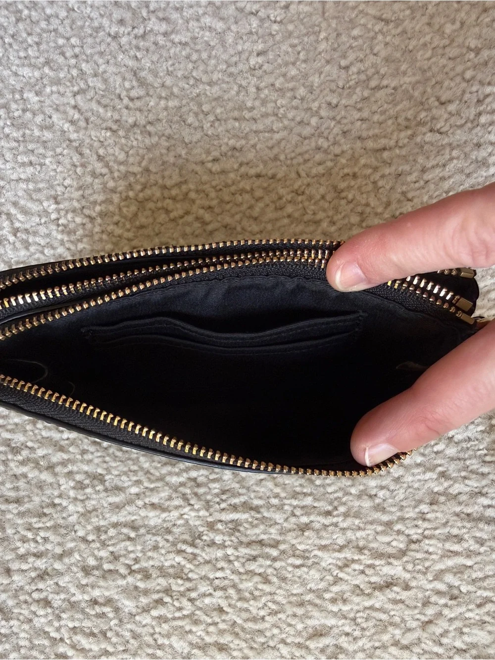 Coach Black Pebbled Leather Pouch with Gold Emblem